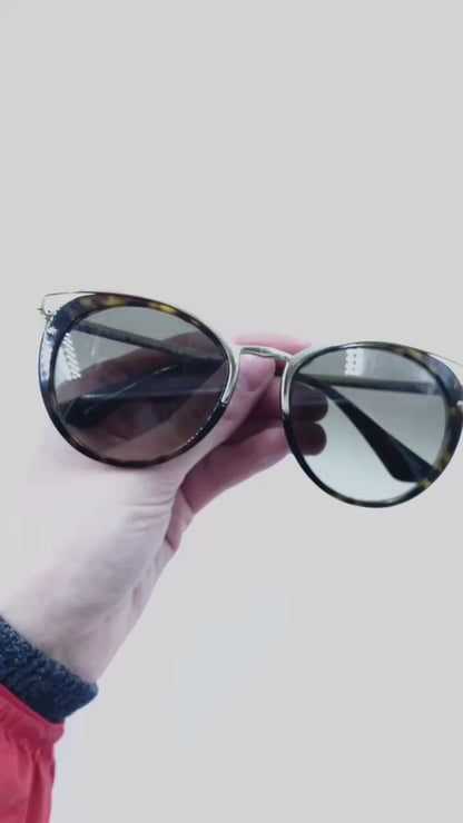 Prada - sunglasses